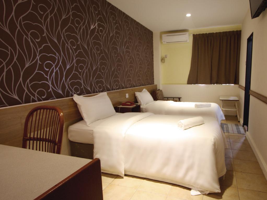 Fata Garden Hotel By Place2Stay Кучинг Номер фото