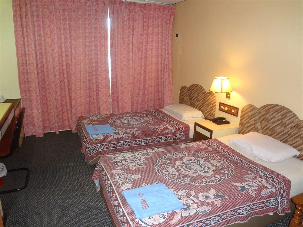 Fata Garden Hotel By Place2Stay Кучинг Экстерьер фото