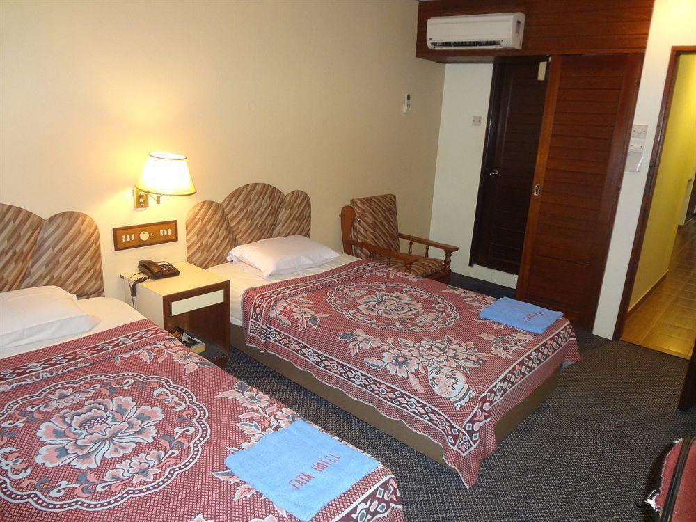 Fata Garden Hotel By Place2Stay Кучинг Экстерьер фото